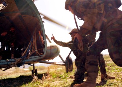 Afghan commandos board an Afghan National Army Air Corps helicopter for an assault exercise. (4489110629)