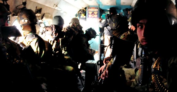 Afghan commandos fill the cabin of an MI-17 Transport helicopter (4422970628)