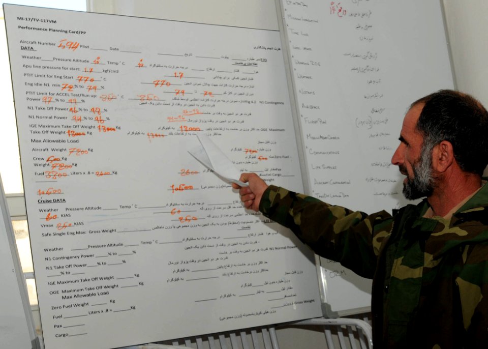 Afghan MI-17 Instructor Pilot trains student for first time (5531255269)