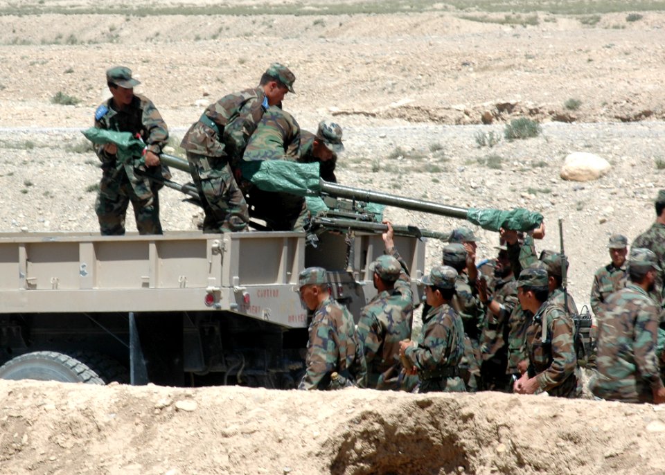 Afghan National Army trainees load two Russain Recoiless Rifles (SPG-9) into the bed of a truck (4706053776)