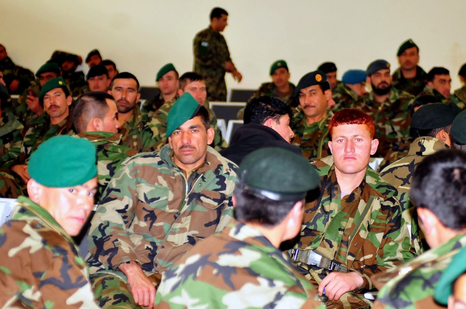 Afghan National Army soldiers watch television or rest as they patiently wait for their C-17 cargo plane (4410157465)