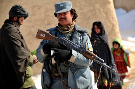 Afghan National Police and coalition special operations forces food handout 120207-N-UD522-181 photo