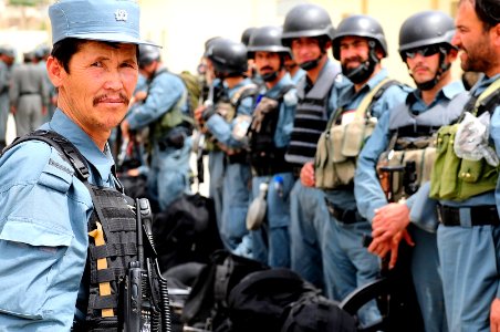 Afghan National Civil Order Police (ANCOP) Non-Commissioned Officer, left, prepares members for an inspection (4527954777) photo