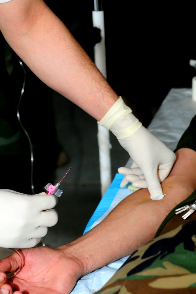 Afghan soldiers practice administering an IV (4509652283)