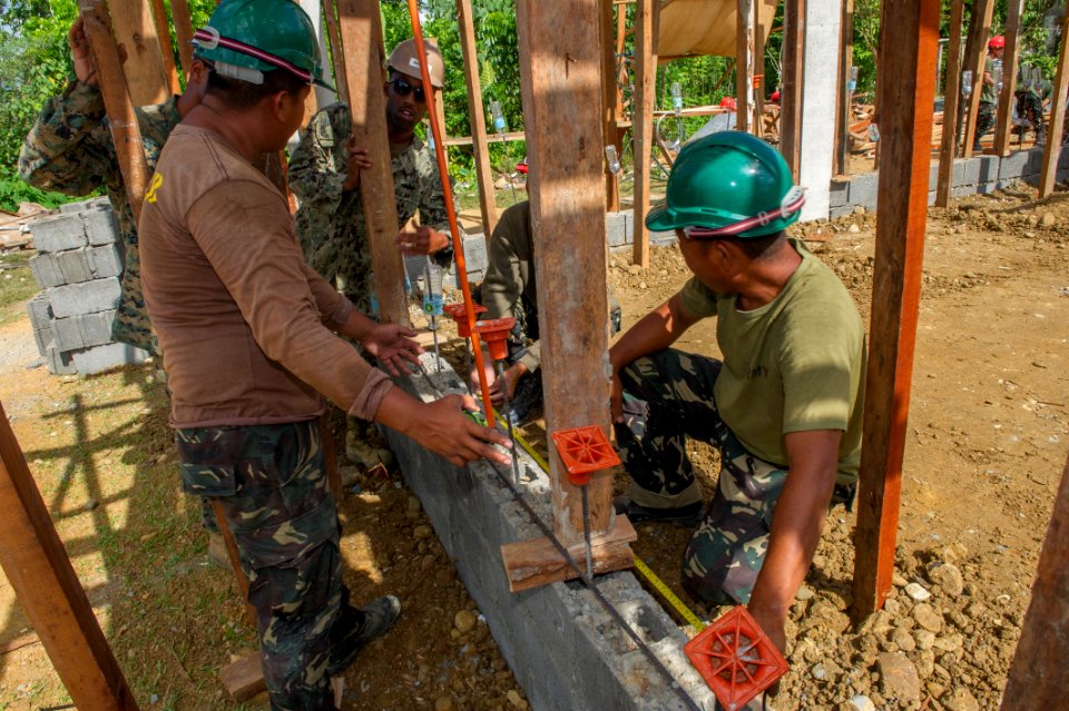 AFP, U.S. building classrooms shoulder to shoulder 150409-N-HA376-582