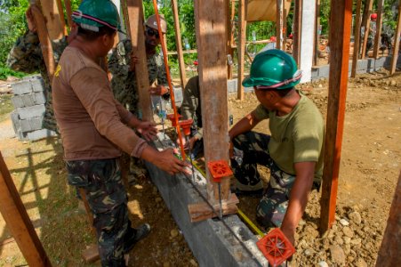 AFP, U.S. building classrooms shoulder to shoulder 150409-N-HA376-582