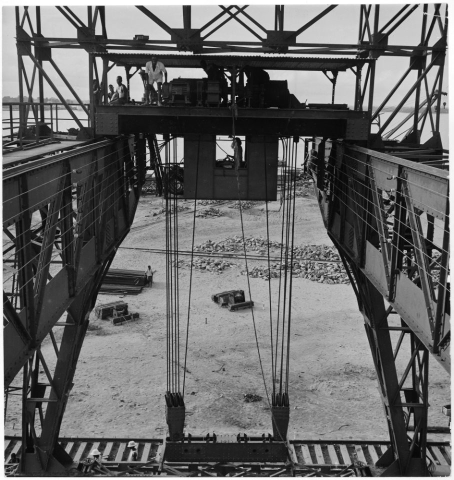 Africa. Cameroons. After the giant concrete blocks are set and ready for use, they are lifted into place by this... - NARA - 541656