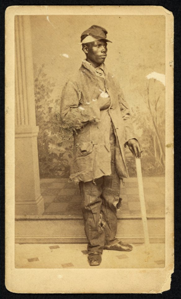 African American man, full-length portrait, facing right) - photographic artist. B. Moses, Cor. Camp and Canal Sts., New Orleans LCCN2010647921