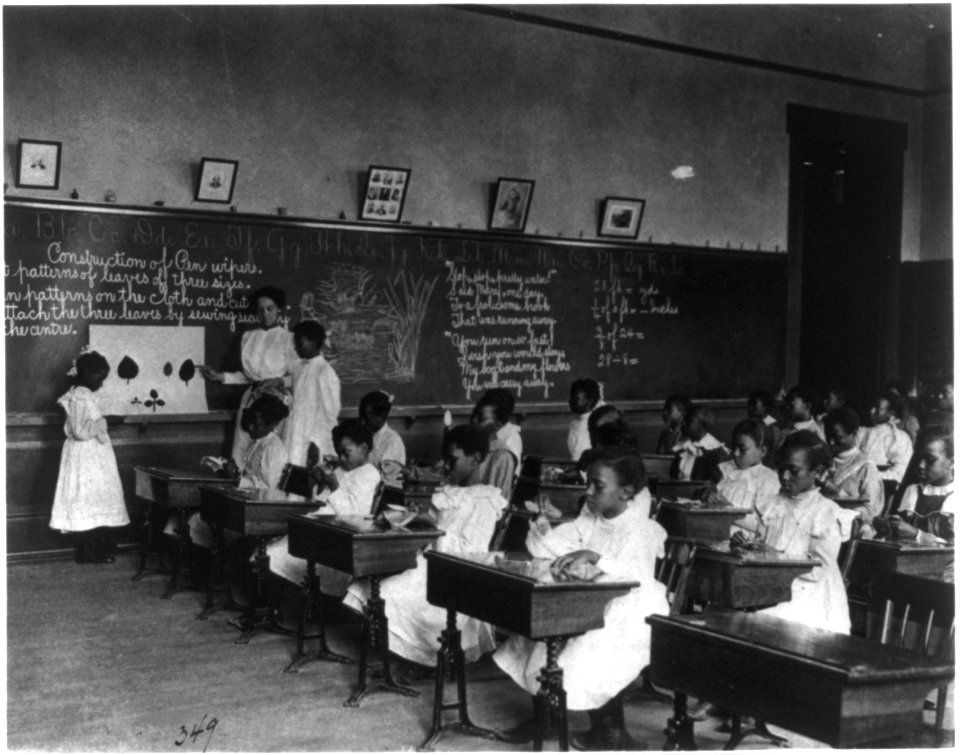 African American schoolgirls in classroom, learning to sew LCCN2001699118
