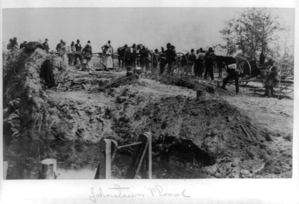 Afro-Americans with wagons at flood site, some digging, Johnstown, Pennsylvania LCCN89712994