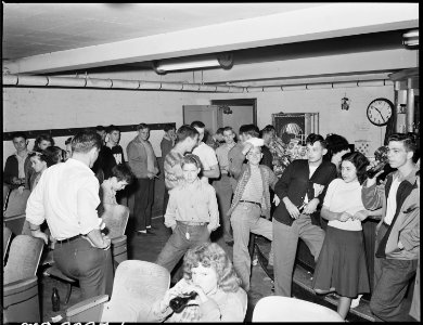 After the movies, snack bar at bowling alleys is crowded with younger generation. Inland Steel Company, Wheelwright... - NARA - 541509