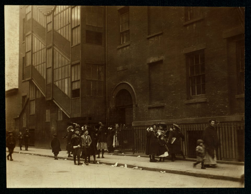 Afternoon dismissal from a parochial school on Mott St. Many of these children go home to spend the afternoon and evening at work. LOC nclc.04084