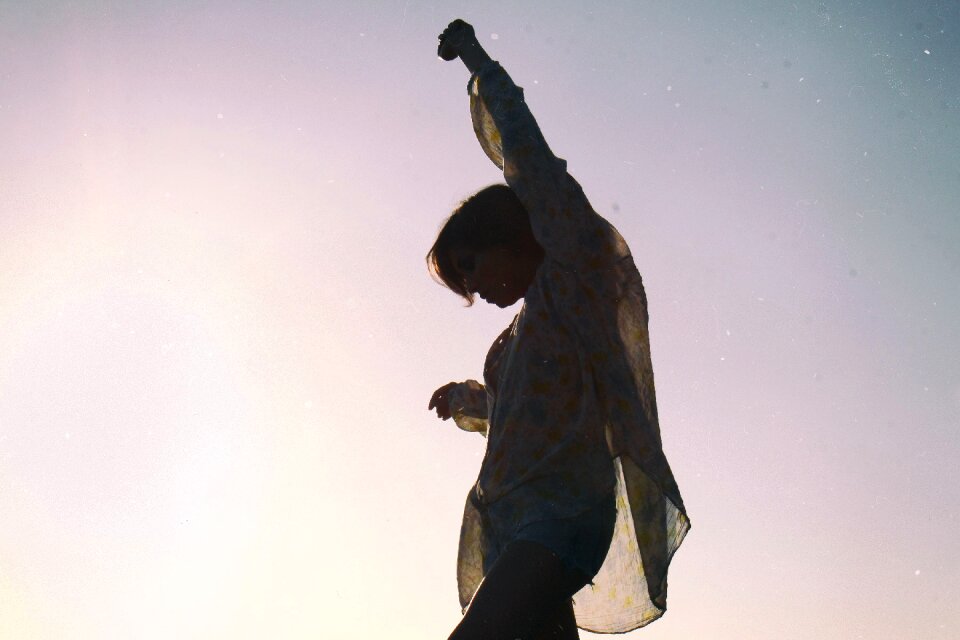 Woman happy sky