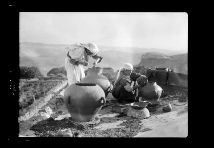 Agriculture, etc. Peasant women making 'Zirs.' Large earthenwear jars LOC matpc.15632 photo