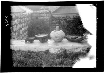 Agriculture, etc. Primitive methods of rubbing and grinding wheat. Excavated stone mortar and bowls LOC matpc.15641