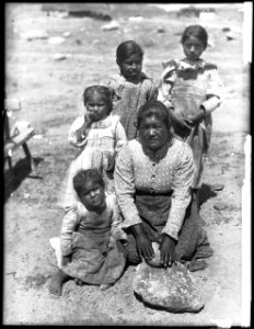 Agua Caliente Indian woman, Nievas Chaves, with a metate stone, 1903 (CHS-3833)