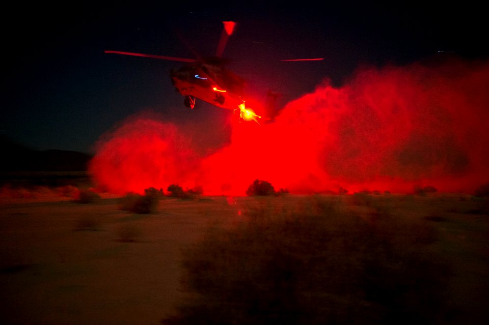 Air crewmen perform a personnel recovery drill