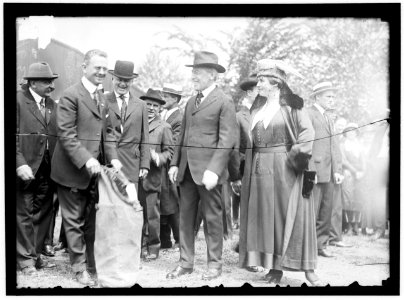 AIR MAIL. INAUGURATION OF SERVICE, POLO FIELD. START OF 1ST CONTINUOUSLY SCHEDULED SERVICE. CURTISS JN-46-H PLANE. PRESIDENT AND MRS. WILSON LCCN2016869151