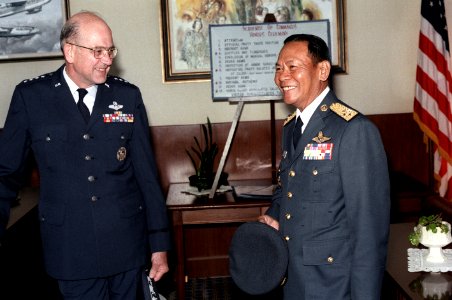 Air Marshall Panieng Karntarat of Thailand talks with GEN Lew Allen U.S. Air Force chief of staff, after his arrival in the United States for a visit photo