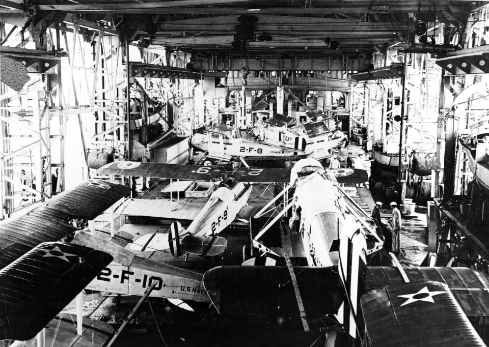 Aircraft in hangar of USS Langley (CV-1), in the 1920s (NH 72927)