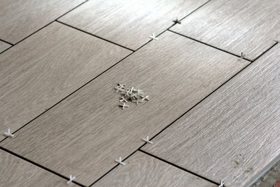 Tic tile floor tiles