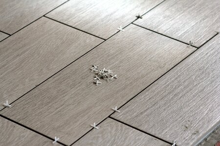 Tic tile floor tiles