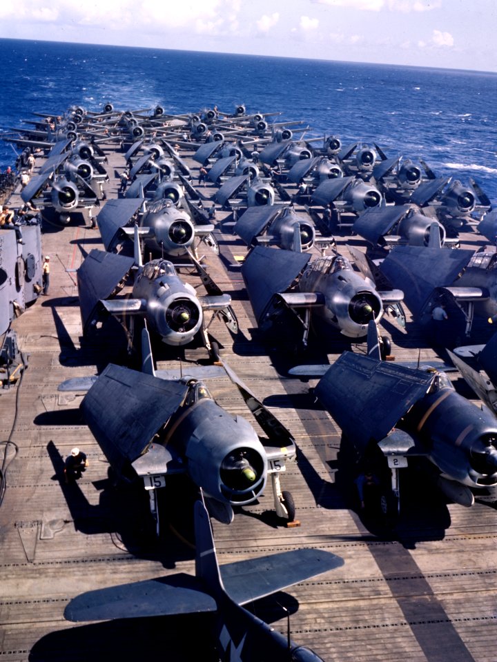 Aircraft of Carrier Air Group 5 warming up on the flight deck of USS Yorktown (CV-10), circa in late 1943 (80-G-K-15092)