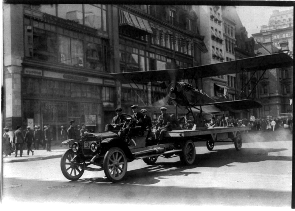 Airplane with engine running on a White truck in Preparedness parade in New York City or Chicago LCCN2002707753