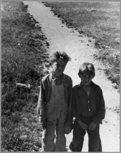 Airport tract, near Modesto, Stanislaus County, California. Boys on their way to school in the morni . . . - NARA - 521633 photo