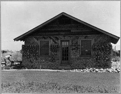 Airport tract, near Modesto, Stanislaus County, California. Another type of home entirely self-built . . . - NARA - 521618 photo