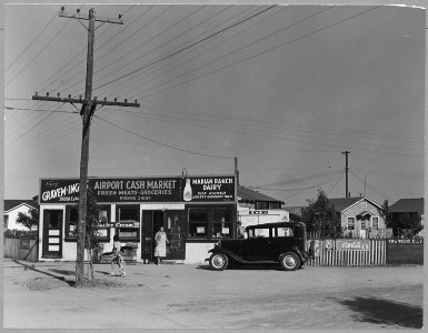 Airport tract, near Modesto, Stanislaus County, California. Typical store in new shacktown community . . . - NARA - 521622 photo