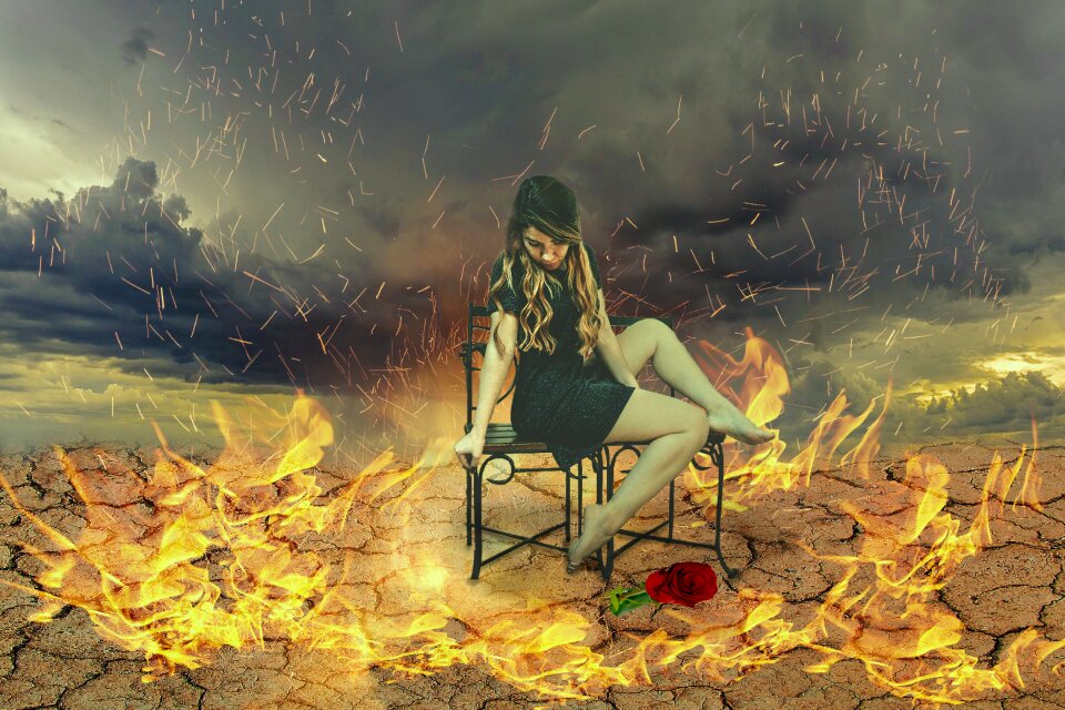 Fire woman sitting on a bench