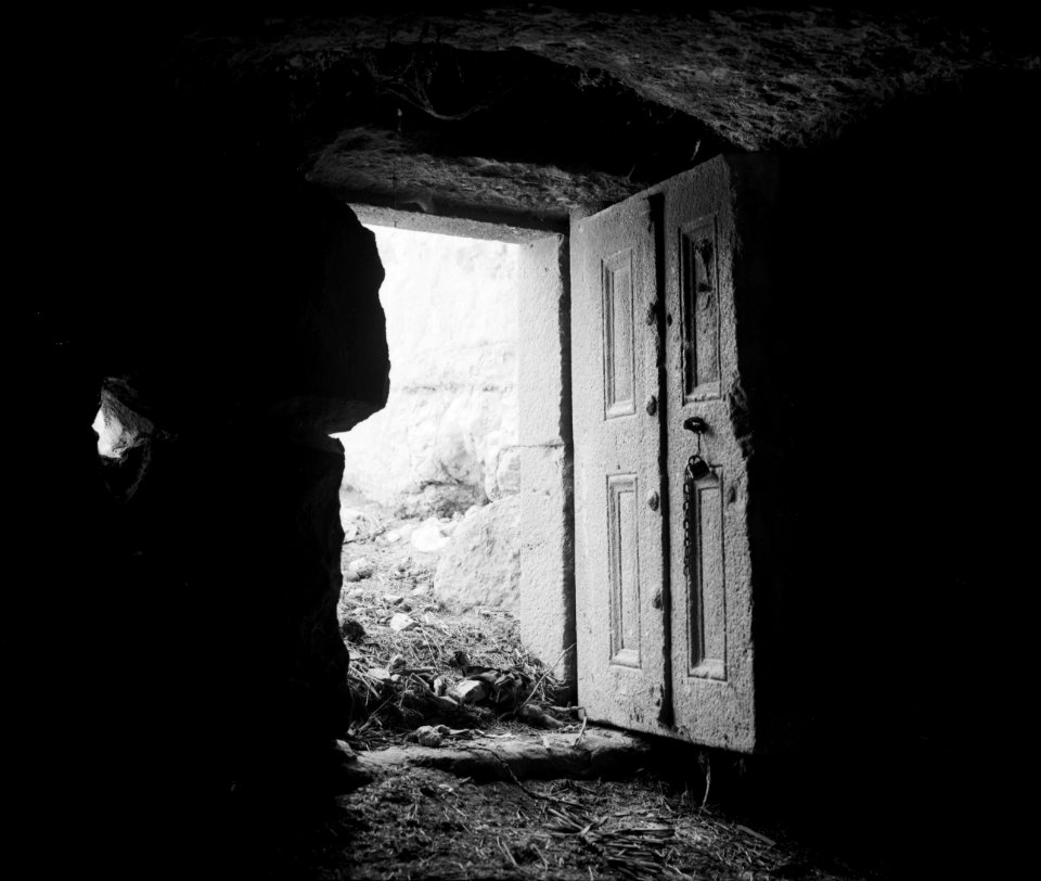 Ajlun district. Stone door at M'keis. Showing basalt door carved to represent wooden panelling LOC matpc.02783 (cropped)