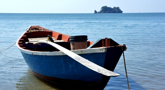 Fishing boat oar water photo