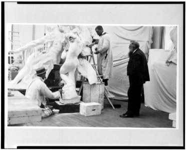 Auguste Rodin observing work on the Monument to Victor Hugo, Lebossé's studio, 1896 LCCN91729505