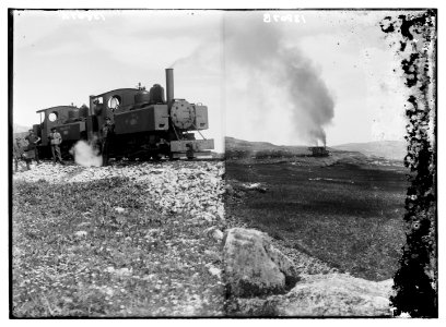 Australian army engineers in 2 locomotives- Pride of the East and Auld Reekie. 1918 ; 2 locomotives pulling train near Tomb of the Judges, 1918 LOC matpc.04688