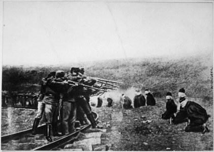 Austria's Atrocities. Blindfolded and in a kneeling position, patriotic Jugo-Slavs in Serbia near the Austrian lines... - NARA - 533647