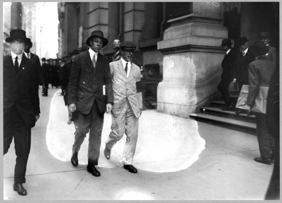 Author Upton Sinclair, in white suit with black arm band, picketing Rockefeller Building LCCN97519133