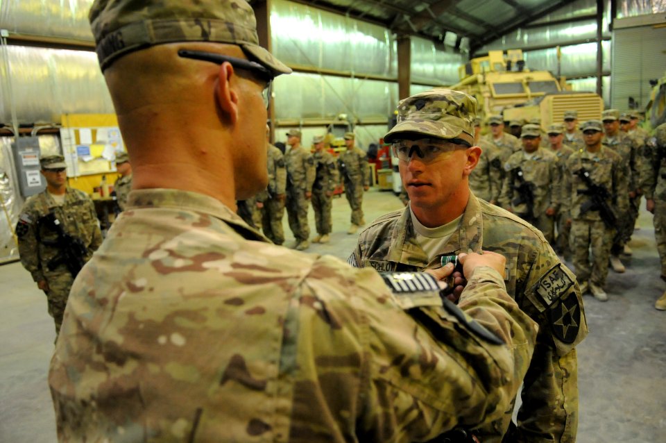 Awards ceremony on FOB Farah 130605-N-LR347-210