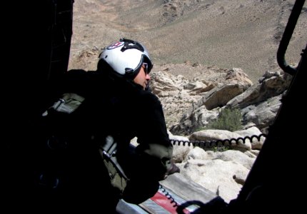 AWS1 Anthony Michalski looks out of helicopter photo