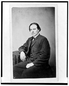 Aze Klein, three-quarter length portrait, seated, facing slightly left LCCN2003679608