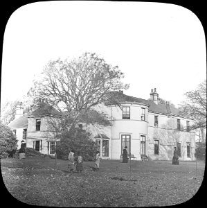 Big House with figures is Government House, Isle of Man (28760390932)