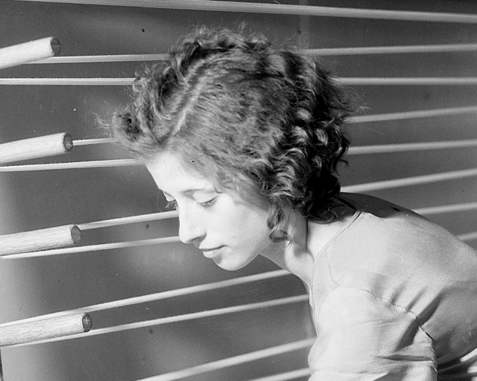 Beula Ogle preparing warp for weaving at the Pi Beta Phi School, Gatlinburg, Tennessee. She is a new weaver at the... - NARA - 532765 (cropped)