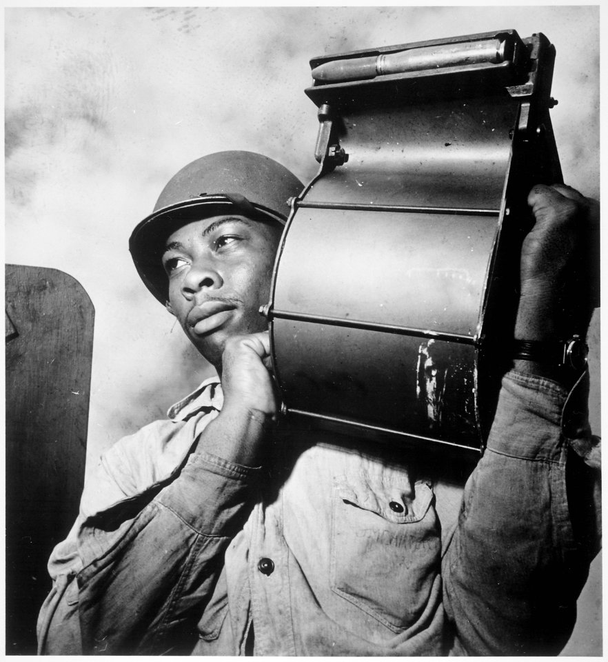 Crewmen aboard U.S.S. Tulagi (CVE-72) en route to southern France for Aug. 15th invasion. Miles Davis King, StM 2-c, ca - NARA - 520763