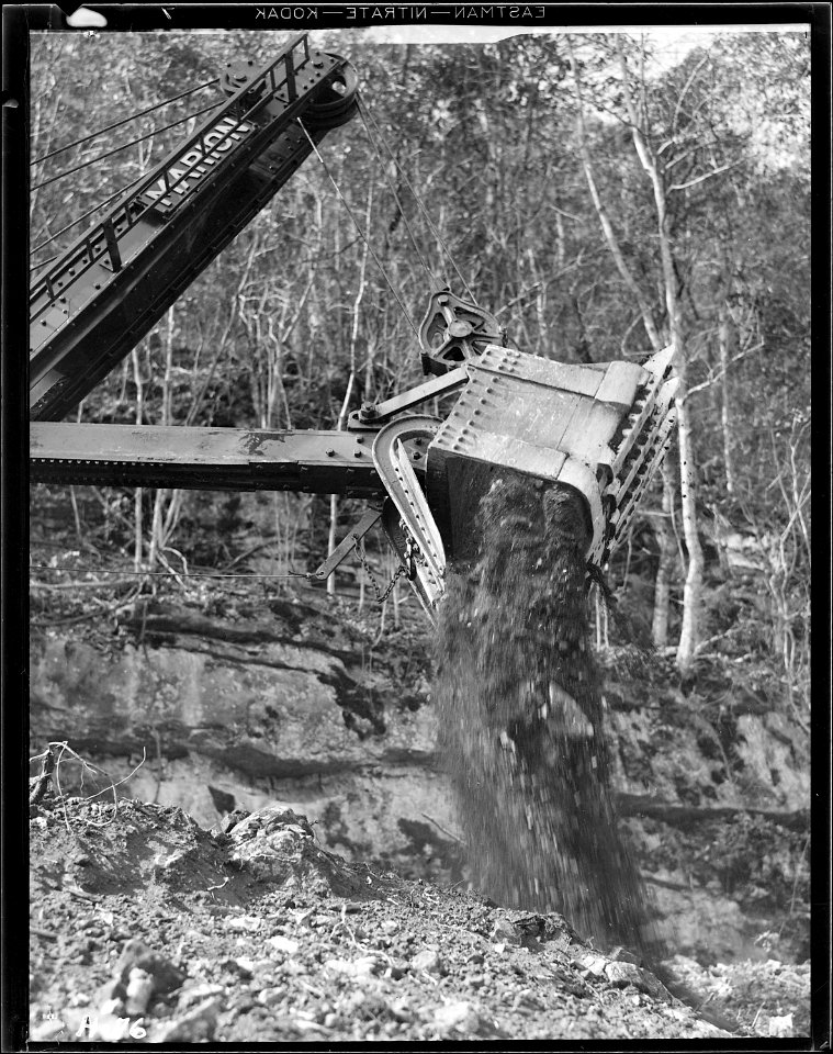 Close-up of the scoop of the power shovel making roadway along the river side at Norris Dam site. - NARA - 532700