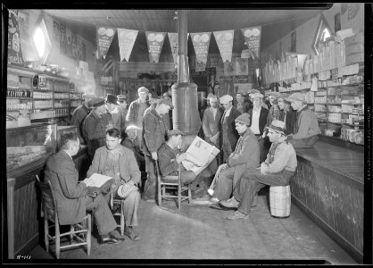 E. H. Elam, interviewer, making personal interviews at Stiner's Store, Lead Mine Bend, Tennessee. This shows how... - NARA - 532729 photo