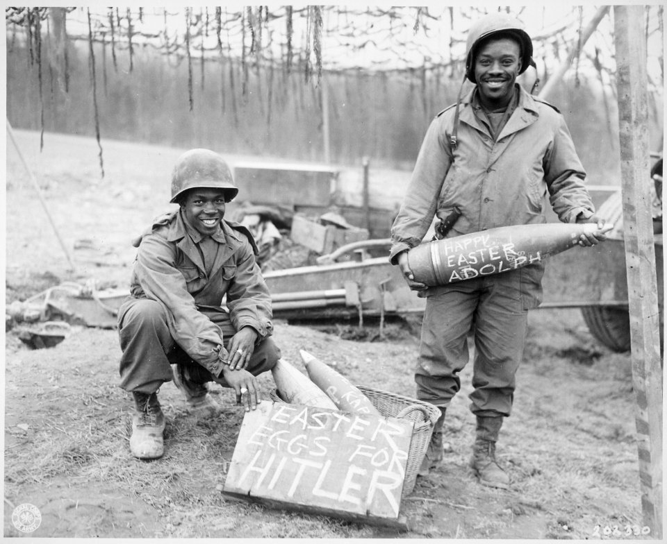 Easter morning, T-5 William E. Thomas...and Pfc. Joseph Jackson...will roll specially prepared eggs on Hitler's lawn., - NARA - 531253