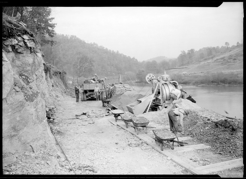 Getting ready for the mixer to pour the first batch of concrete at Norris Dam site. This was used on the foundations... - NARA - 532711