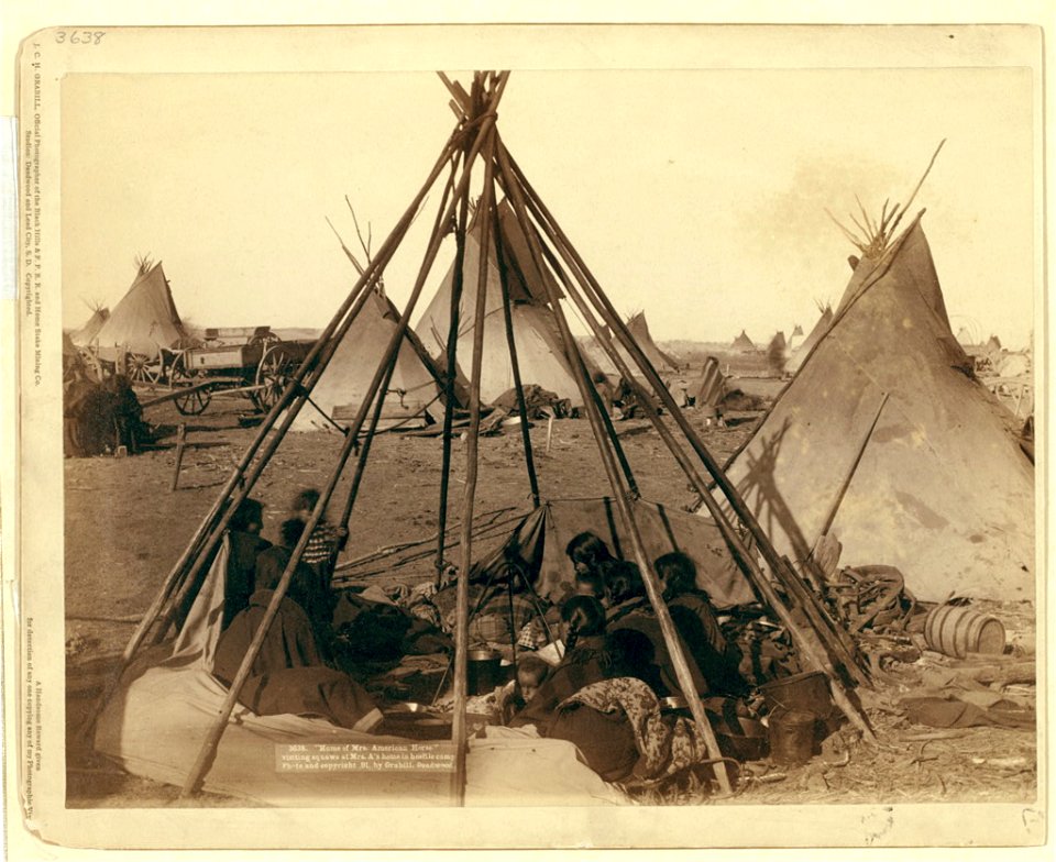 Home of Mrs. American Horse. Visiting squaws at Mrs. A's home in hostile camp LCCN99613804