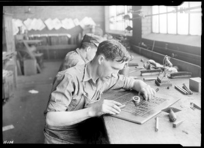 Hiram Hughes, 659 Branch Street, Kingsport, Tennessee. Hughes is shown here at work at the Kingsport Press building... - NARA - 532753